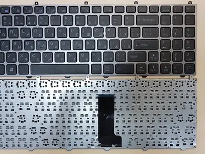 Клавиатура для ноутбука DNS W650SR чёрная, рамка серая